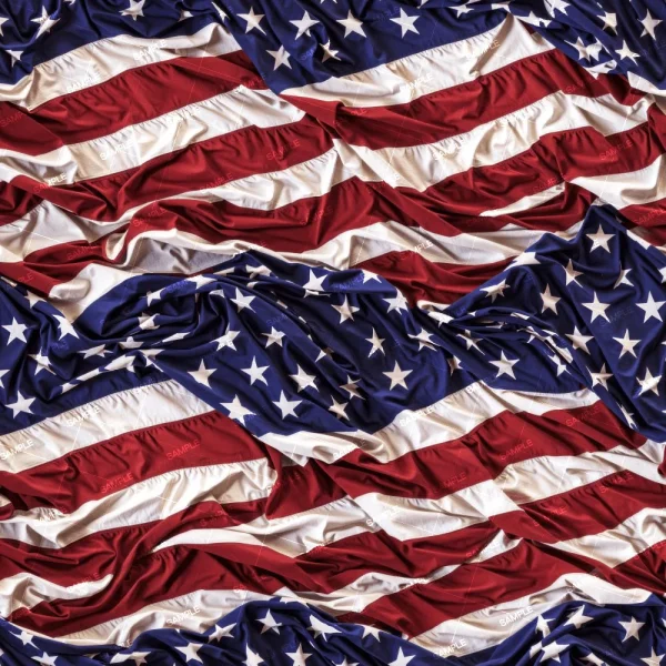 The image shows multiple overlapping and crumpled United States flags, creating a textured pattern of red and white stripes, and white stars on a blue field. The arrangement is irregular with visible folds and creases.