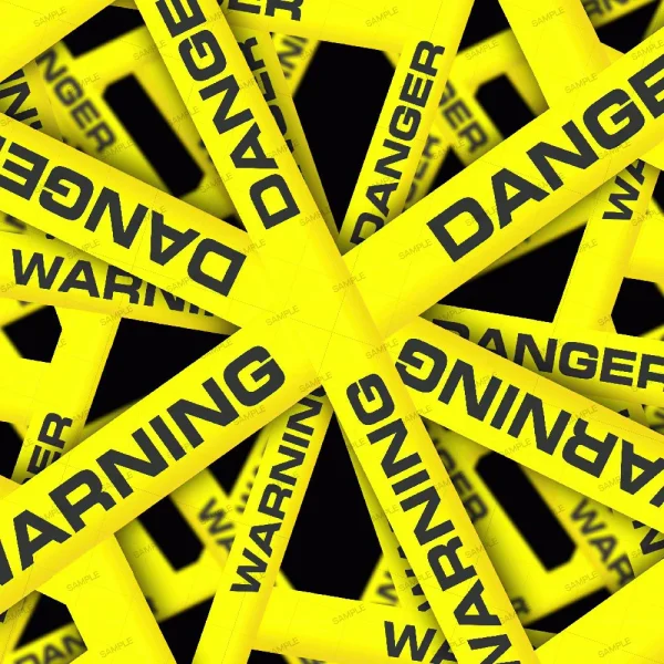 Yellow warning and danger tapes crisscross in a chaotic pattern against a black background. The tapes bear the words "WARNING" and "DANGER" in bold, black letters. The image conveys a sense of caution and alert.