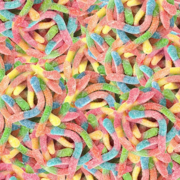 A heap of vibrant Gummy Bears 23 (Copy), sugar-coated and overlapping, fills the frame with bright hues of pink, yellow, blue, green, and orange.