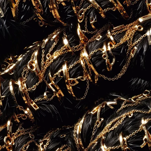 River of Gold (Copy) features shiny, reflective gold chains and rings intertwined over a black, textured background. The dense, layered jewelry pattern stands out against the dark surface for a striking visual effect.