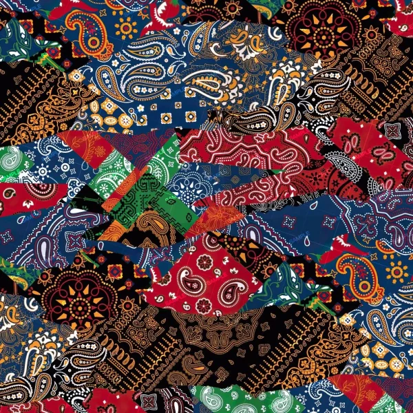 Satin Silk Fabric (Copy) features a lively patchwork of overlapping squares and strips with paisley and bandana designs in red, blue, green, orange, black, and white for a colorful, busy look.