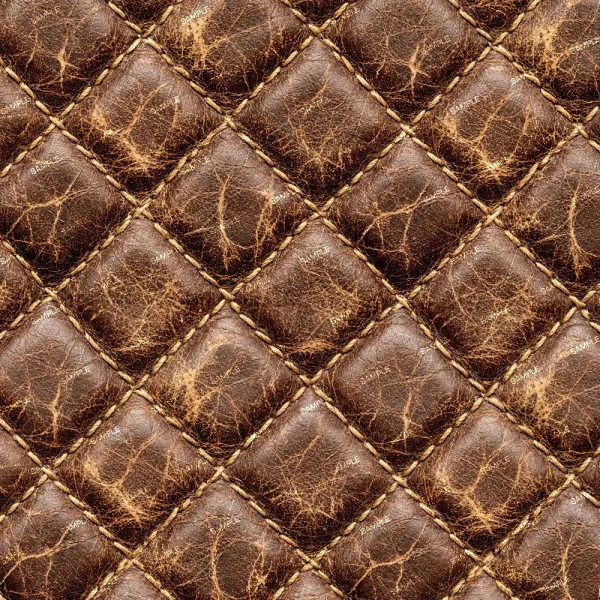 Close-up of Distressed Diamond Stitched Leather 41 (Copy), featuring a brown, quilted texture with diamond-shaped stitching, visible creases, and wear in a repeating pattern.
