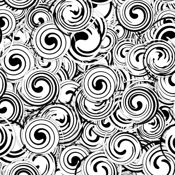 A dense pattern of black and white spirals overlapping each other, creating a hypnotic and dynamic visual effect. The spirals vary slightly in size and thickness, forming an intricate and chaotic design.