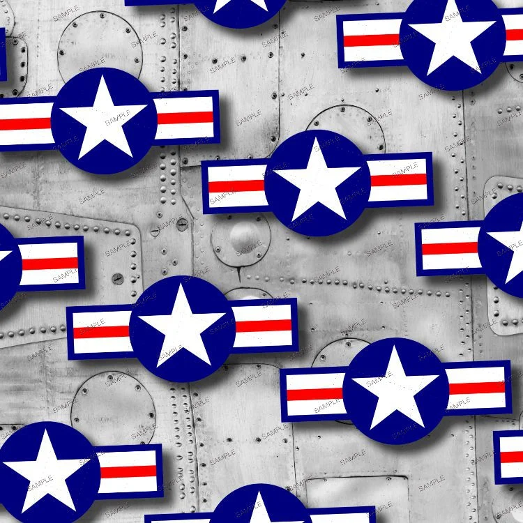 US Air Force Symbol 27 displayed as a pattern of roundels featuring a white star inside a blue circle with flanking horizontal red and white bars, set against a background of riveted metal panels.